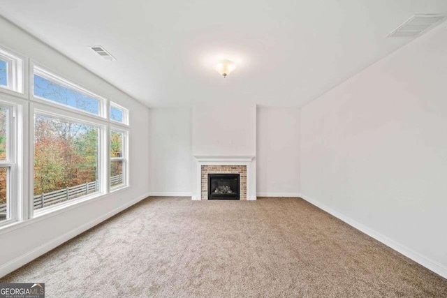 904 Berry Ct, Canton, GA 30114 - unfurnished living room featuring carpet flooring and a fireplace