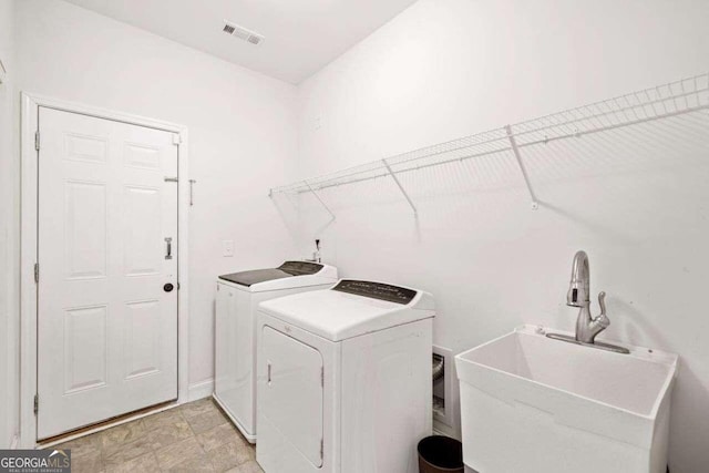 904 Berry Ct, Canton, GA 30114 - laundry room featuring separate washer and dryer and sink