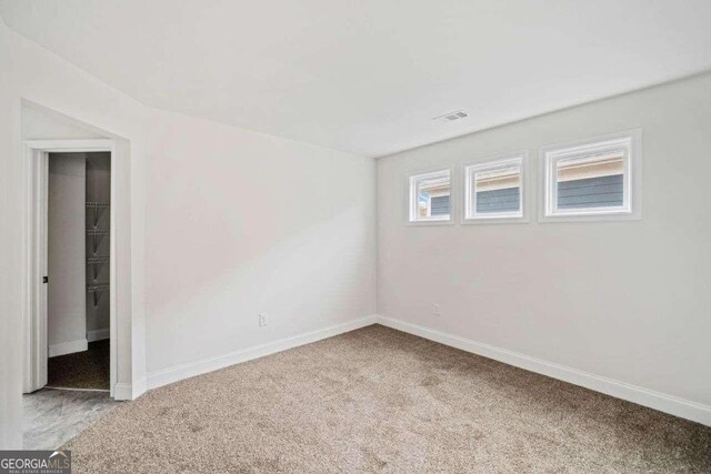 904 Berry Ct, Canton, GA 30114 - unfurnished room with light carpet