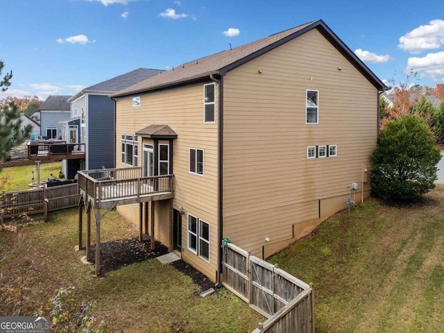 904 Berry Ct, Canton, GA 30114 - rear view of property with a lawn and a wooden deck