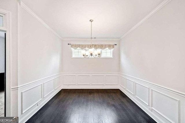 904 Berry Ct, Canton, GA 30114 - unfurnished dining area featuring dark hardwood / wood-style floors, crown molding, and a chandelier