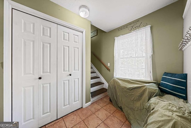 living area with light tile patterned floors