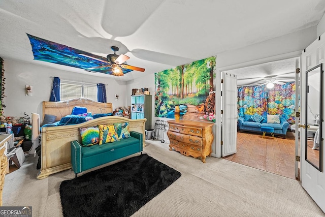 bedroom featuring carpet and ceiling fan