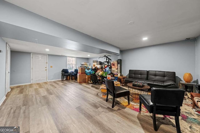 living room with light hardwood / wood-style flooring