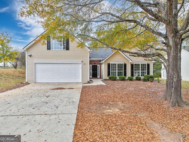 view of front of home with a garage