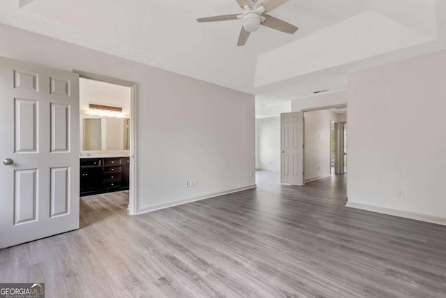 unfurnished room featuring ceiling fan and light hardwood / wood-style floors