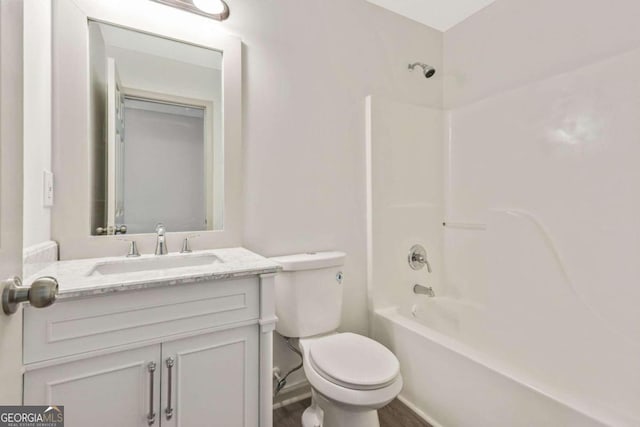 full bathroom with shower / bathing tub combination, vanity, and toilet