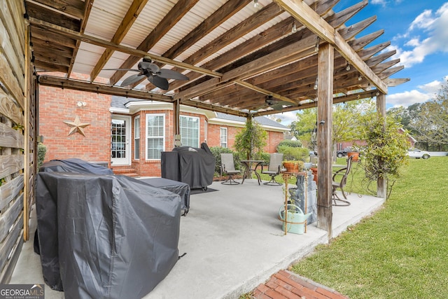 view of patio / terrace with ceiling fan and a grill