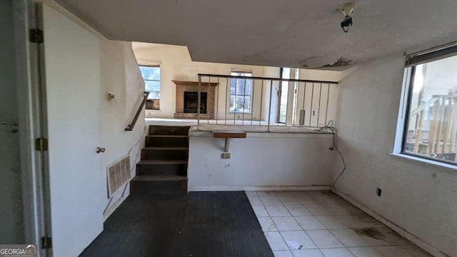 interior space featuring tile patterned flooring