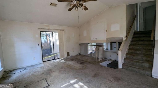 interior space with vaulted ceiling and ceiling fan