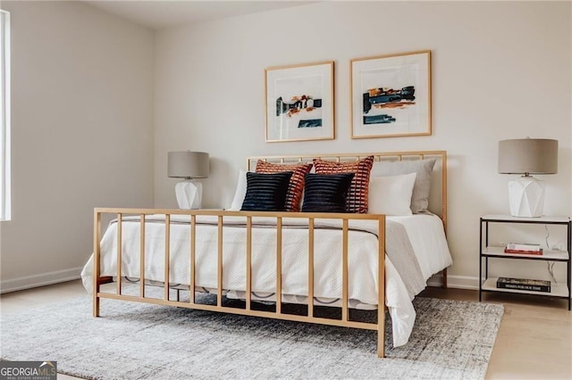 bedroom featuring hardwood / wood-style flooring