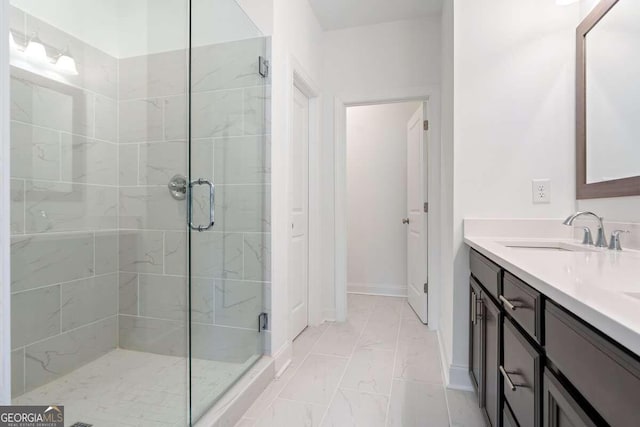 bathroom with vanity and an enclosed shower