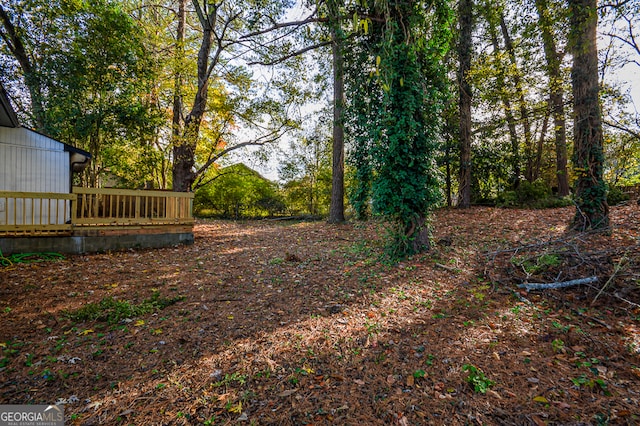 view of yard featuring a deck