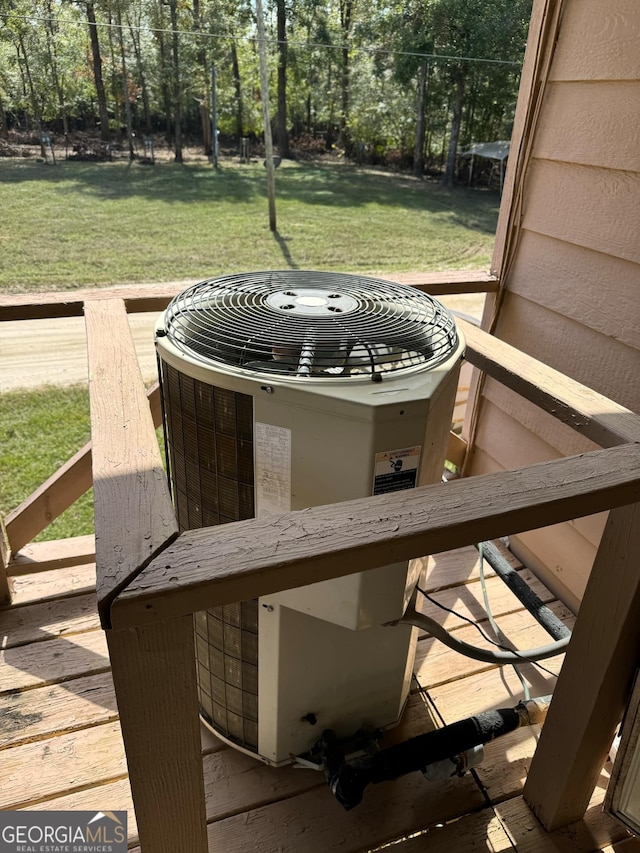 exterior details featuring cooling unit