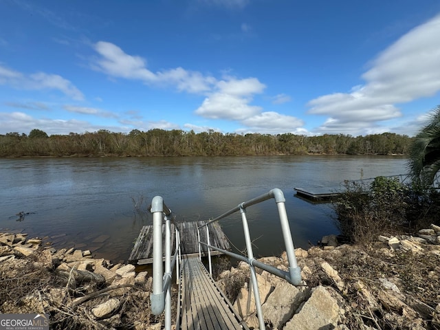 view of dock with a water view