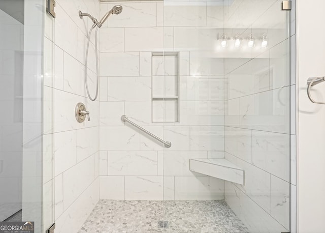 bathroom featuring an enclosed shower