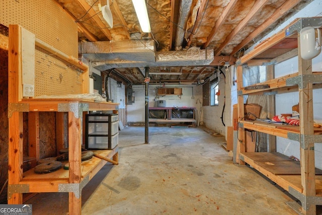 basement with a workshop area