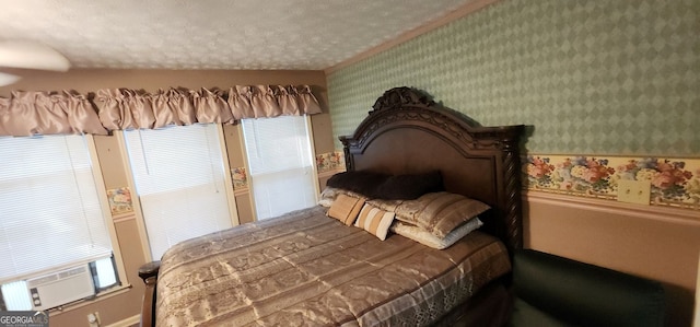 bedroom with a textured ceiling, cooling unit, and crown molding