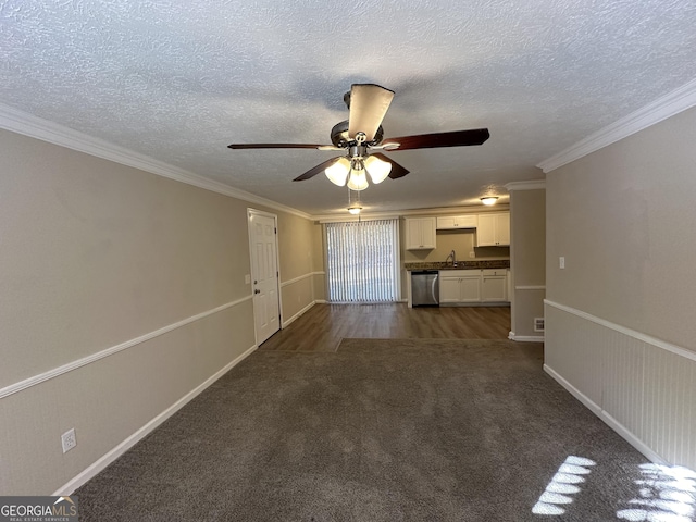 4906 Springbrook Dr, Douglasville, GA 30135 - unfurnished living room with a ceiling fan, dark colored carpet, a textured ceiling, and ornamental molding