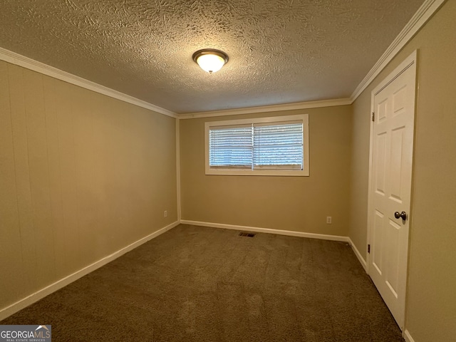 carpeted spare room featuring crown molding and a textured ceiling