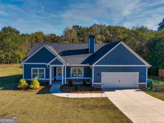 craftsman-style house with a front yard and a garage