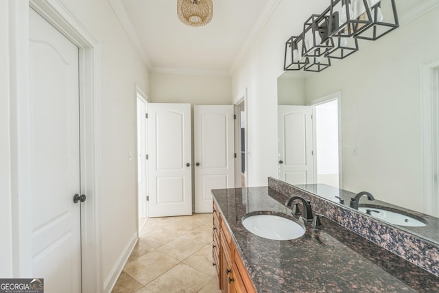 bathroom featuring vanity, tile patterned floors, and crown molding