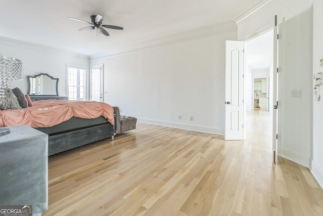 bedroom featuring light hardwood / wood-style floors, ceiling fan, and ornamental molding