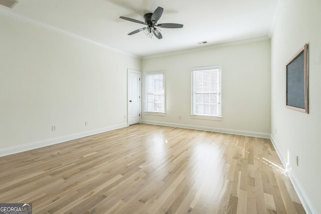 unfurnished room with ceiling fan, light hardwood / wood-style floors, and ornamental molding