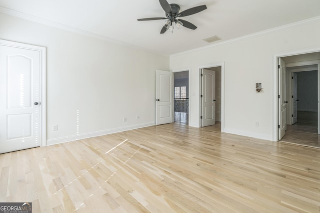 unfurnished bedroom featuring ceiling fan, ornamental molding, and light wood-type flooring