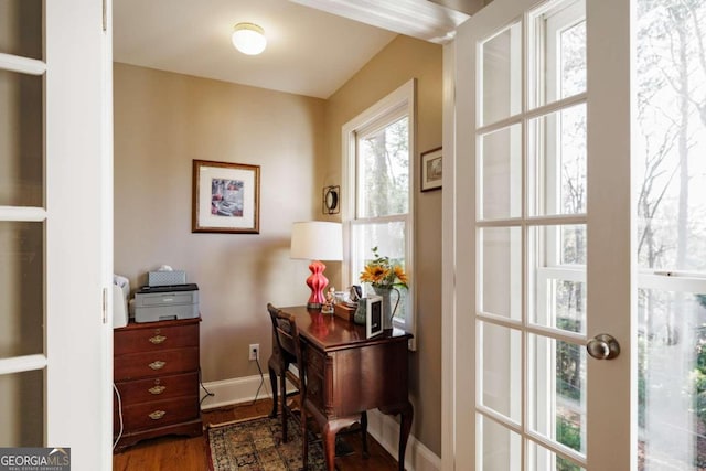 doorway to outside with dark hardwood / wood-style floors