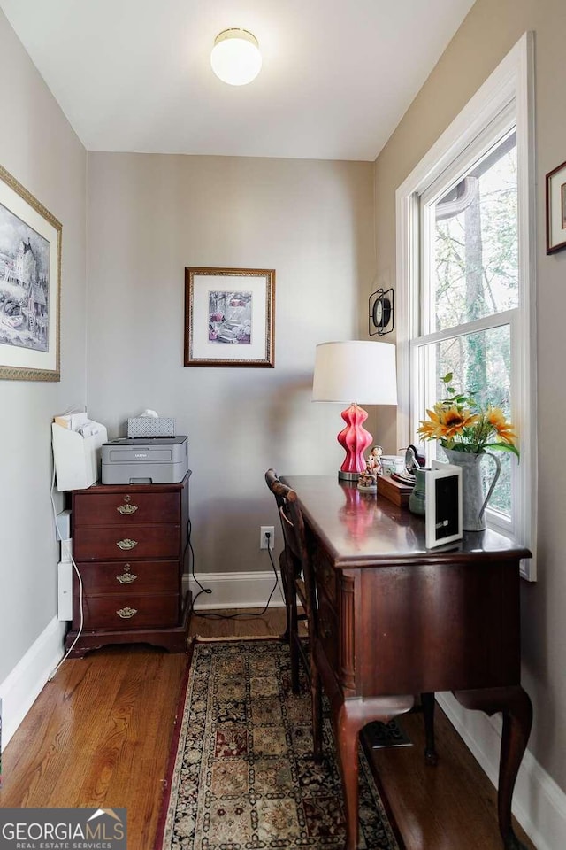 home office featuring dark hardwood / wood-style floors