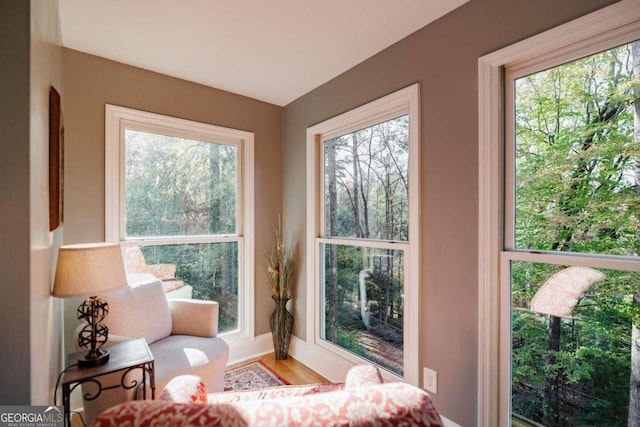 sunroom featuring a wealth of natural light