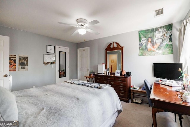 carpeted bedroom featuring ceiling fan