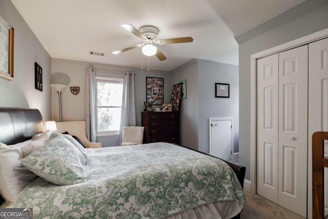 carpeted bedroom featuring ceiling fan