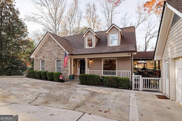 cape cod house with covered porch