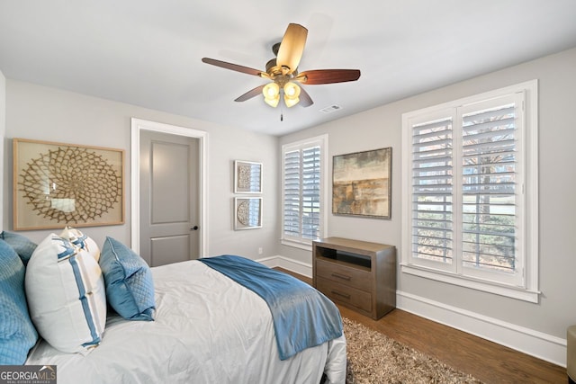 bedroom featuring ceiling fan and hardwood / wood-style floors