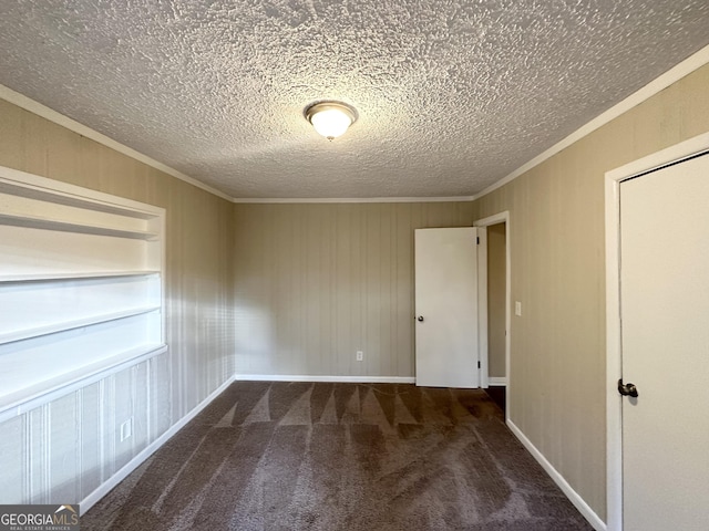 1737 Mckenzie Dr, Decatur, GA 30032 - empty room featuring ornamental molding, carpet, and a textured ceiling