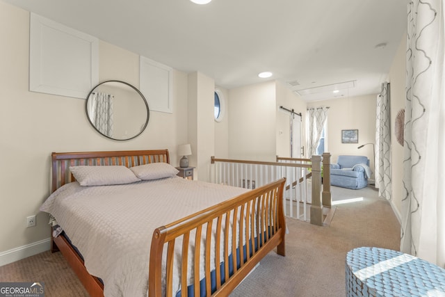 bedroom featuring attic access, recessed lighting, light carpet, and baseboards