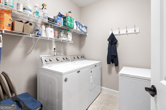 laundry room with washer and clothes dryer