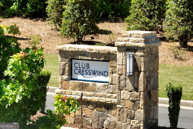 view of community sign