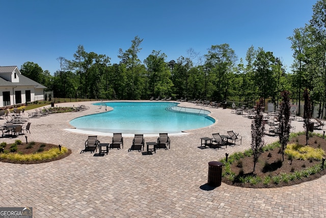 view of pool with a patio