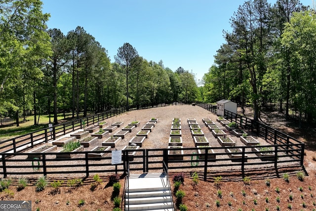 view of community with a shed