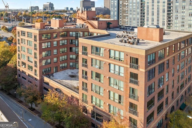 view of building exterior featuring a view of city