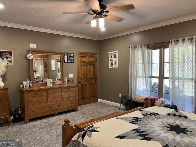 carpeted bedroom featuring ceiling fan, crown molding, and a textured ceiling