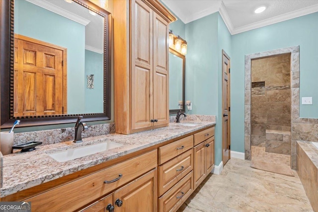 bathroom featuring crown molding, vanity, and tiled shower