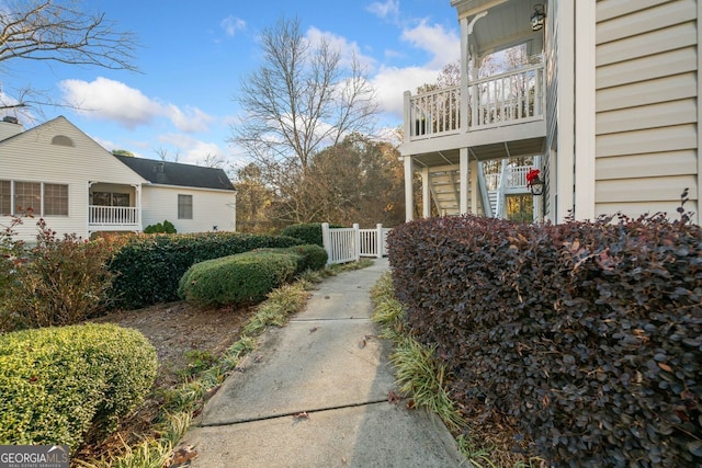 view of property exterior with a balcony