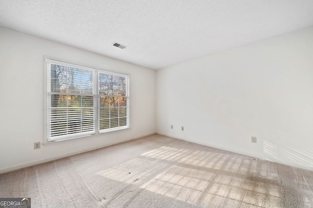 1115 Cannongate Xing SW, Marietta, GA 30064 - unfurnished room with carpet flooring and a textured ceiling