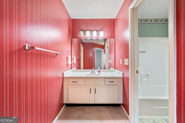 1115 Cannongate Xing SW, Marietta, GA 30064 - full bathroom with wallpapered walls, vanity, a textured ceiling, and a shower