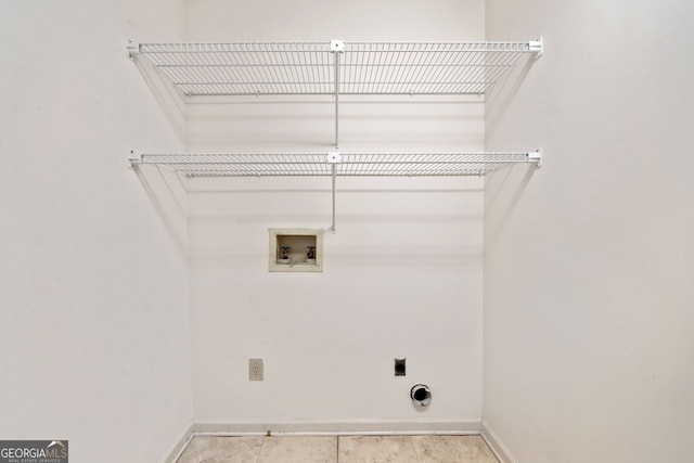1115 Cannongate Xing SW, Marietta, GA 30064 - washroom featuring electric dryer hookup, hookup for a washing machine, and tile patterned flooring