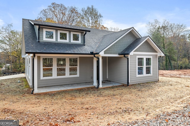 view of front of property featuring a patio